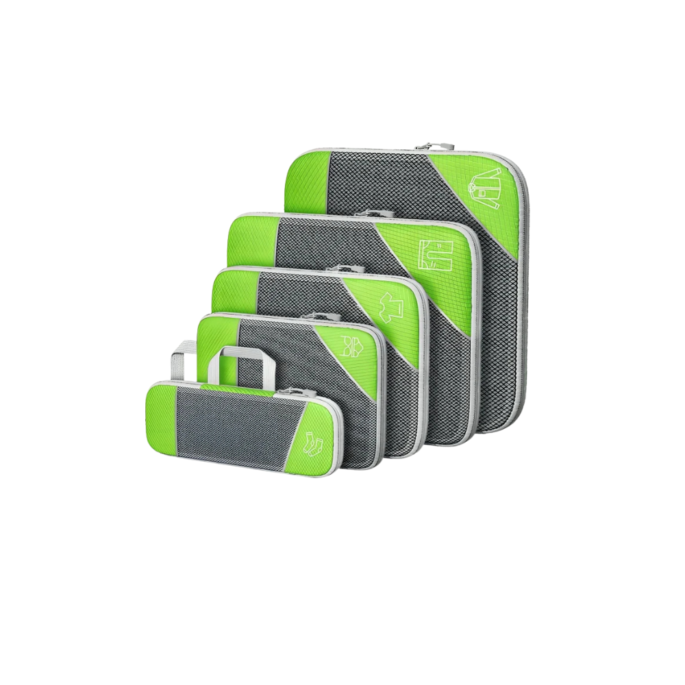 Set of green and gray packing cubes on a white background