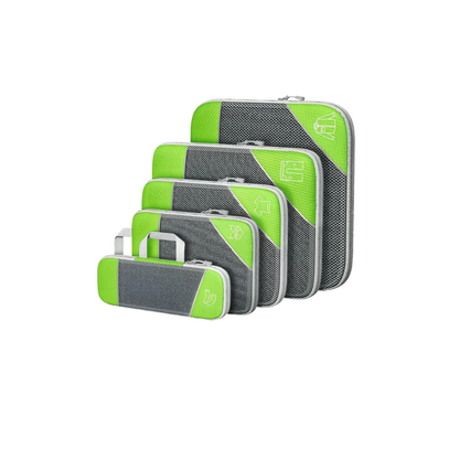 Set of green and gray packing cubes on a white background