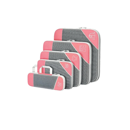 Set of pink and gray packing cubes on a white background